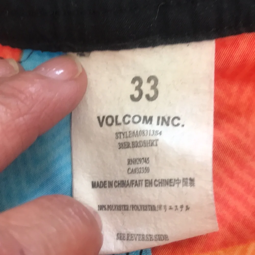 Volcom swim trunks size 33‎ orange and turquoise great condition